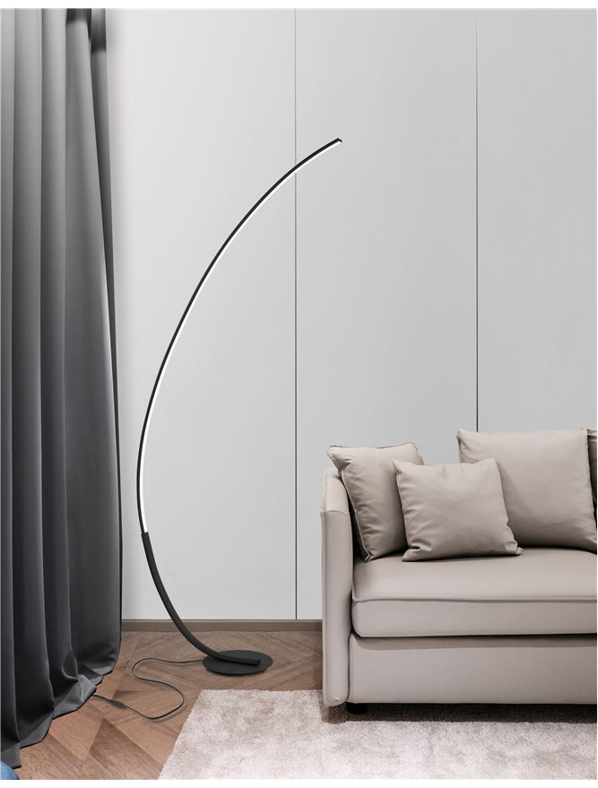 PREM Sandy Black Aluminium & Acrylic Arched Floor Light - Beside the sofa