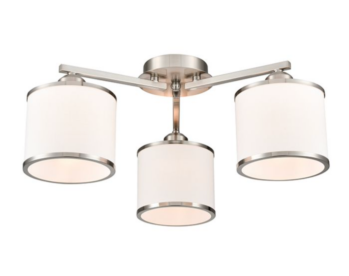 A modern three-light ceiling fixture with a brushed nickel/silver metal frame and cylindrical white fabric shades, shown against a plain white background.