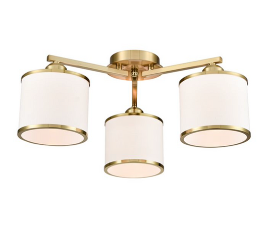 A modern three-light ceiling fixture with a brushed gold metal frame and cylindrical white fabric shades, shown against a plain white background.