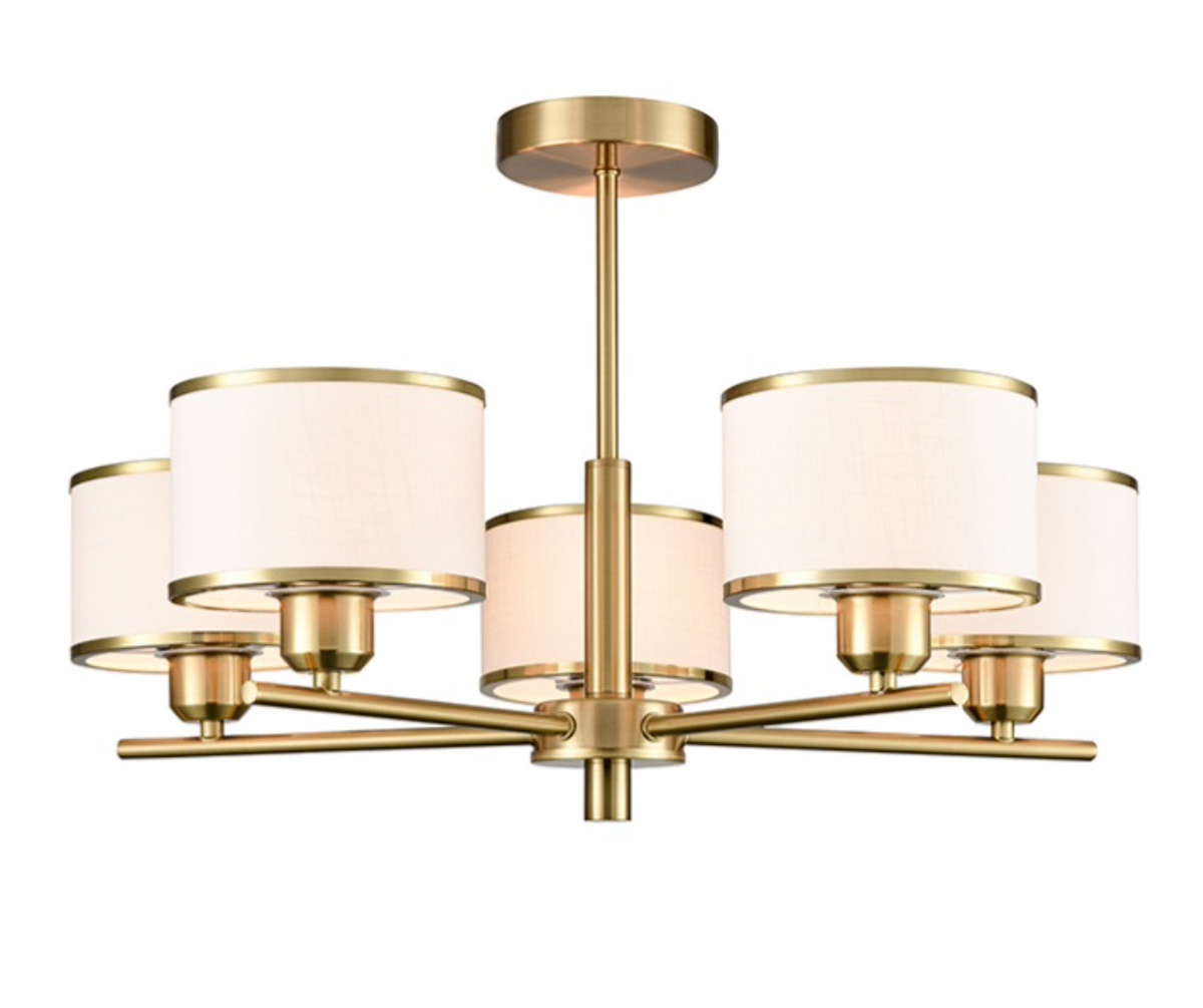 A modern six-light chandelier with a brushed gold metal frame and cylindrical white fabric shades, shown against a plain white background.