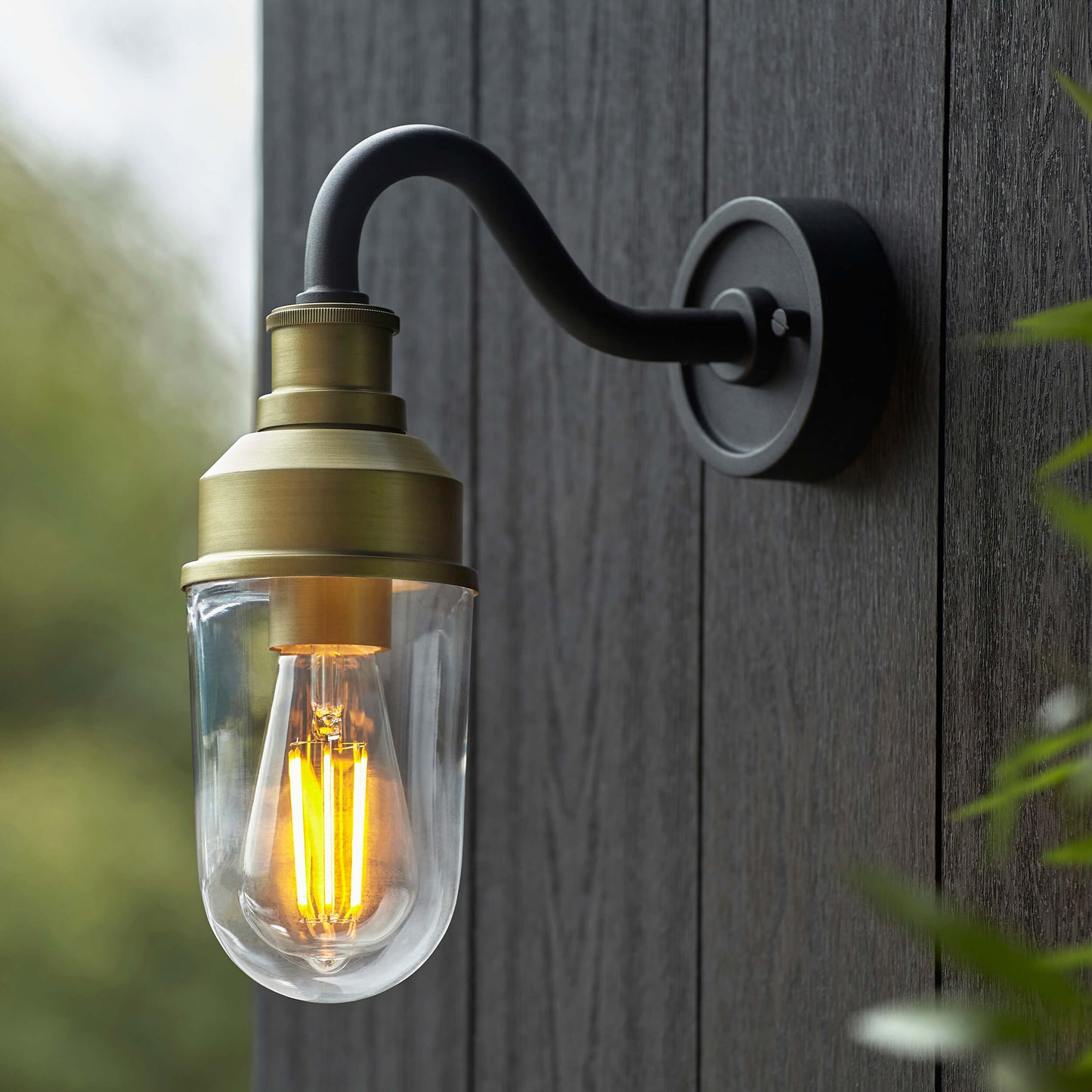 Matt Antique Brass Curved Arm Wall Light With Clear Glass  - ID 12497
