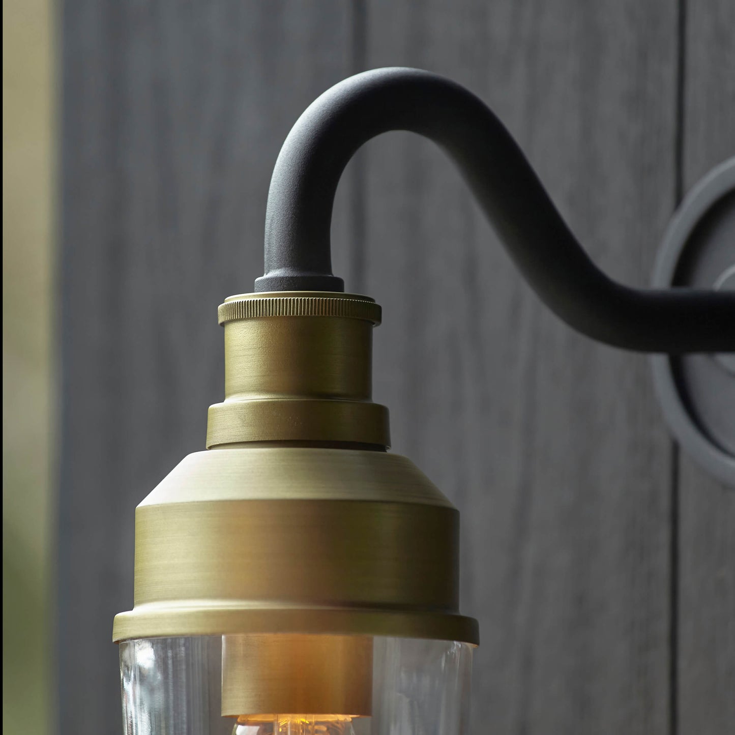Matt Antique Brass Curved Arm Wall Light With Clear Glass  - ID 12497